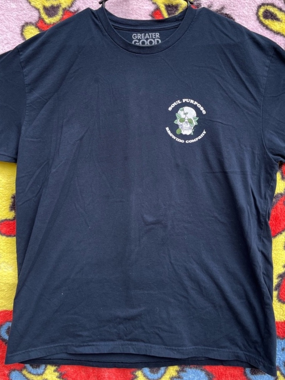 Greater Good Black Graphic Tee with Small Chest Logo brewing
